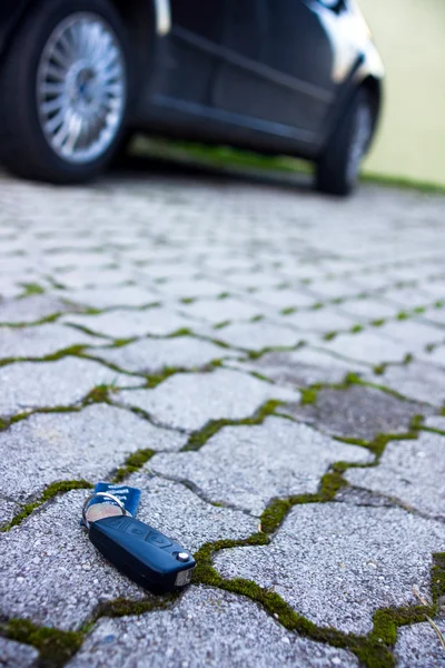 stock image Key from the car and a charm.