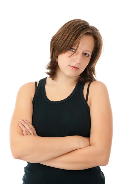 Giovane donna in posa con le braccia incrociate — Foto Stock