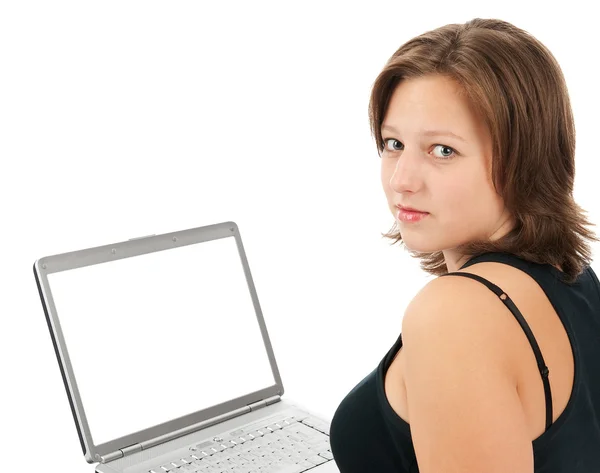 Jonge vrouw met een laptop — Stockfoto
