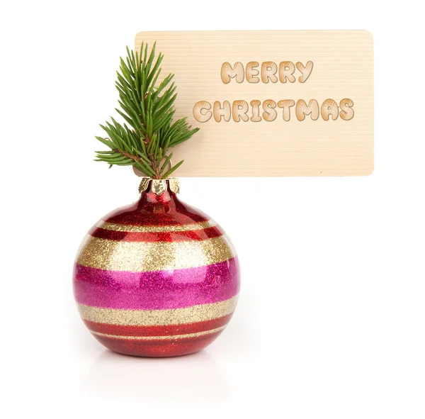 Bola de Natal com cartão de saudação em branco — Fotografia de Stock