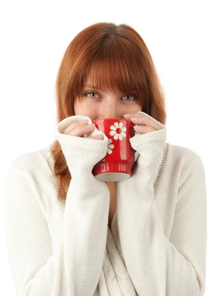 Smiling young female drinking a cup of coffee — Stock Photo, Image