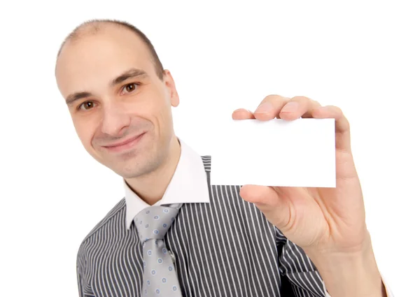 Hombre de negocios entregando una tarjeta de visita en blanco —  Fotos de Stock