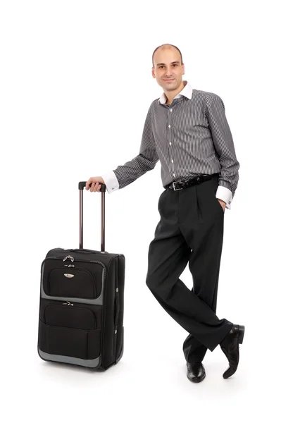 Молодой бизнесмен с багажной сумкой — стоковое фото