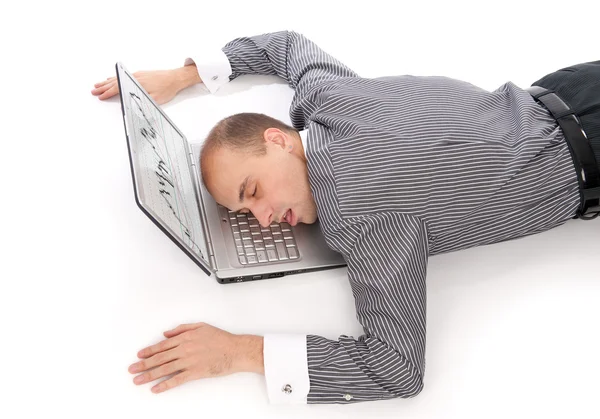 Giovane uomo d'affari dormire sul computer portatile — Foto Stock