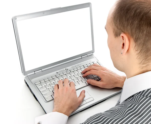 Giovane uomo d'affari che lavora di un computer portatile — Foto Stock