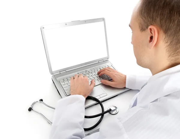 Вид сзади на молодого врача с ноутбуком — стоковое фото