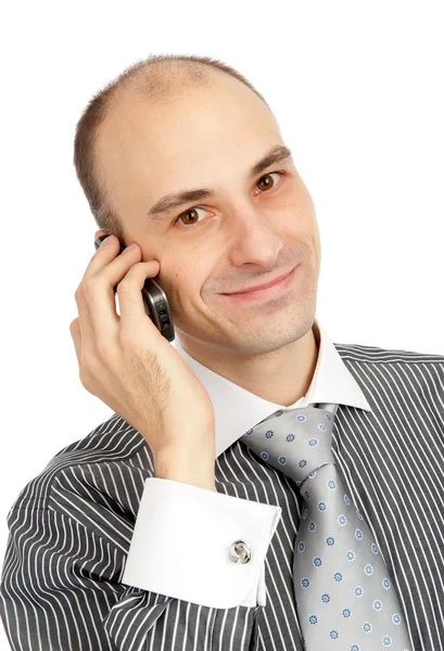 Vértes portré egy boldog fiatal srác beszél a mobiltelefon — Stock Fotó