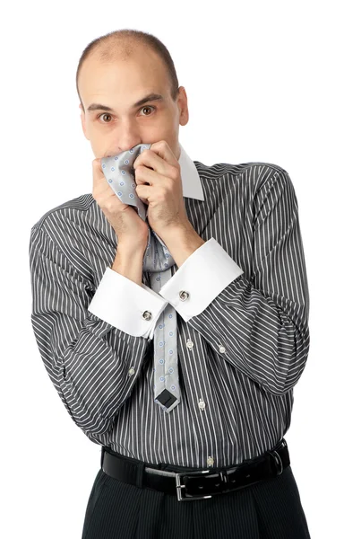 Homem de negócios preocupado segurando as mãos na boca — Fotografia de Stock