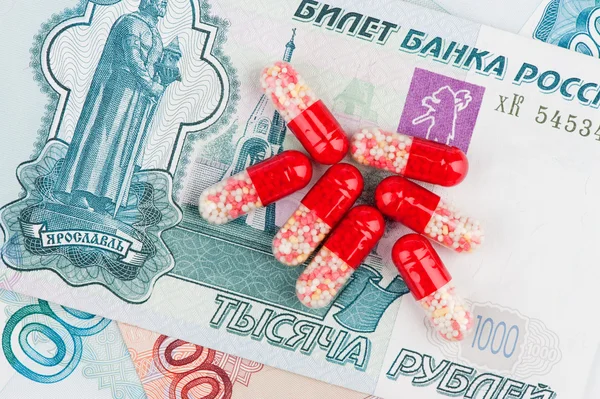 Píldoras y dinero — Foto de Stock
