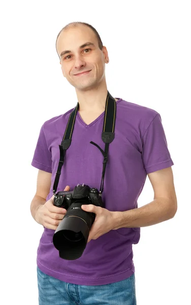 Homem bonito com uma câmera fotográfica — Fotografia de Stock