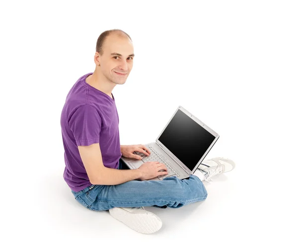 Young Man Sitting Using Laptop — Stock Photo, Image