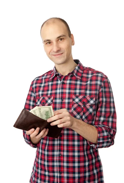 Homem segurando alguns dólares — Fotografia de Stock