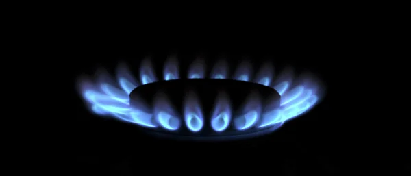 Estufa de gas azul en la oscuridad —  Fotos de Stock