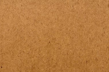 Natural brown recycled paper texture background clipart