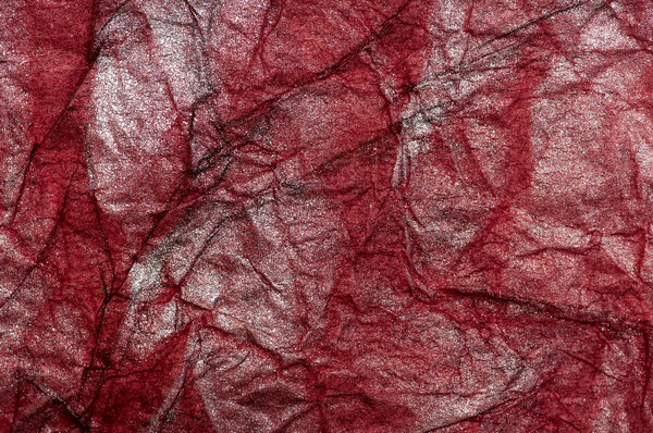 Crushed red paper texture