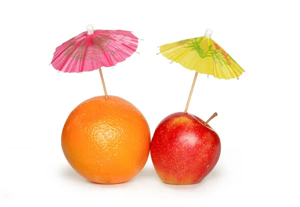Frutta con ombrelloni Foto Stock Royalty Free