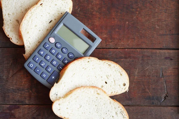 Sliced White Bread Calculator Lying Wooden Surface Copy Space — Stock fotografie