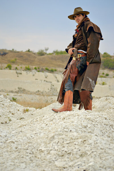 Handsome man in cowboy clothes