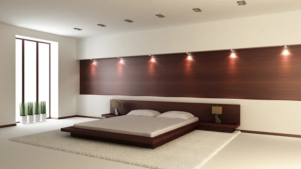 Modern interiör av ett sovrum Stockbild