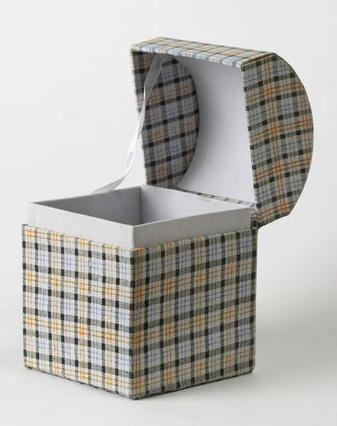 Μικρό Κενό Κουτί Κλωστοϋφαντουργικών Παρούσα Πέρα Από Γκρι Ντεγκραντέ Υπόβαθρο — Φωτογραφία Αρχείου