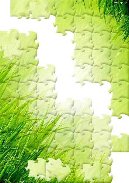 背景としてのパズルの形で緑の芝生 — ストック写真