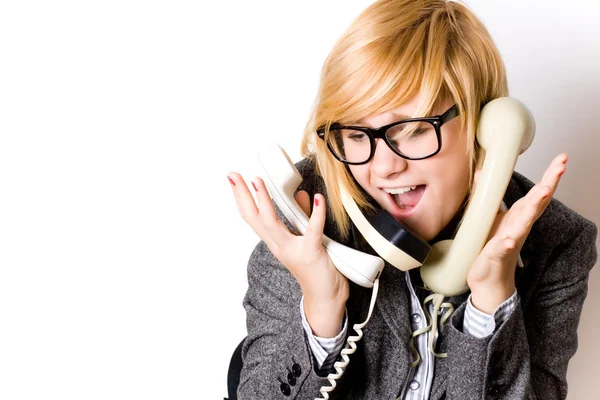 Affärskvinna med tre telefoner — Stockfoto