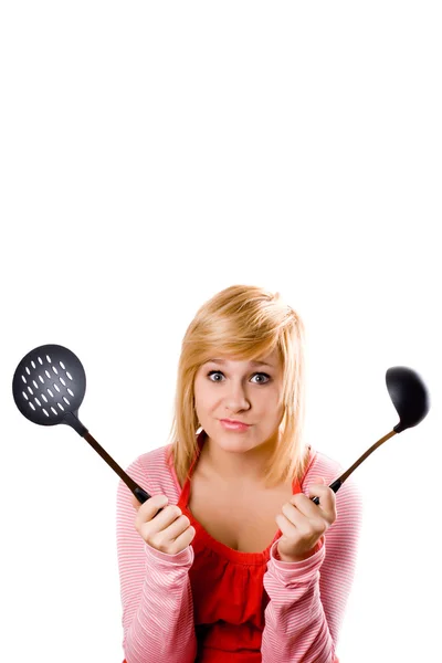 Jovem dona de casa com utensílio de cozinha — Fotografia de Stock