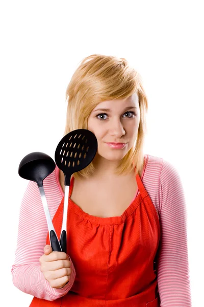 Молода домогосподарка з кухонним посудом — стокове фото