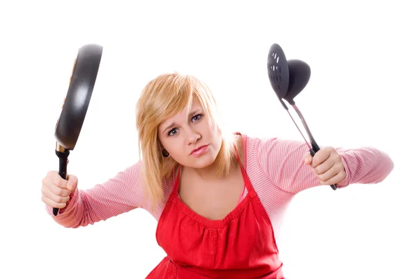 Pretty housewife with kitchen utensil and pan — Stock Photo, Image