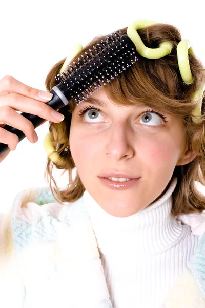 Woman with curlers and hearbrush — Stock Photo, Image