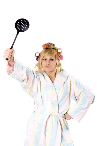 Funny housewife with curlers and skimmer — Stockfoto
