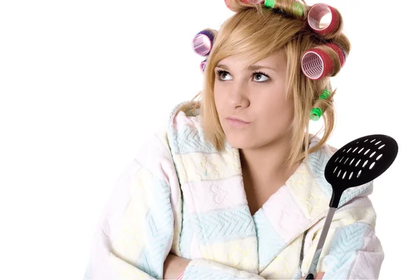 Funny housewife with curlers and skimmer — Stockfoto