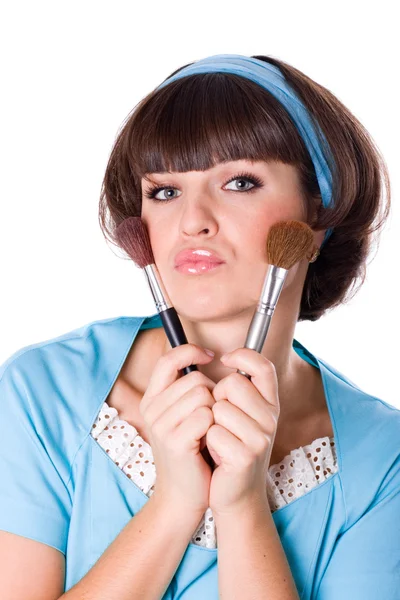 Woman with two make-up brushes — Stock Photo, Image