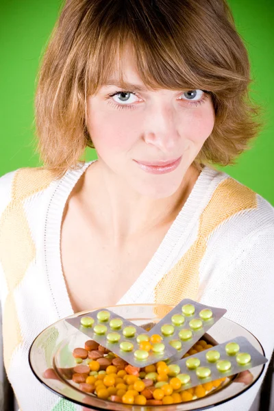 Woman with heap of pills — Stock Photo, Image