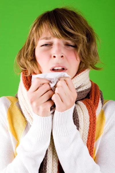 Girl sneezes — Stock Photo, Image