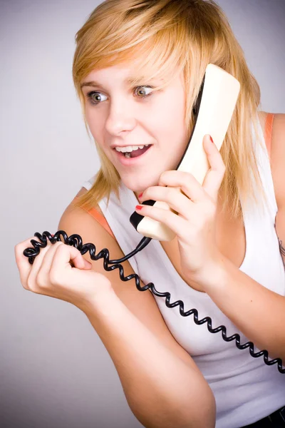 Kobieta z telefonem retro — Zdjęcie stockowe