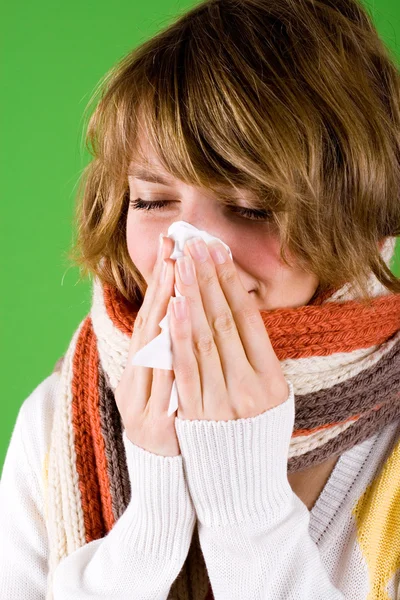 Cold girl sneezes — Stock Photo, Image