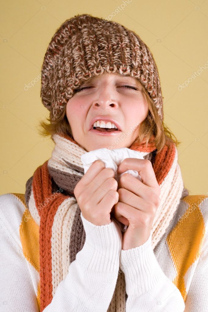 Cold girl sneezes