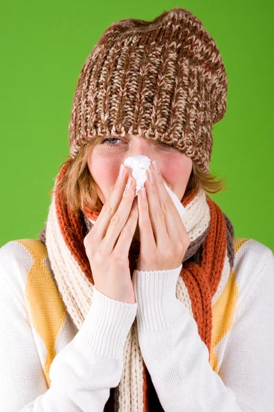 Sneezing woman with handkerchief — Stock Photo, Image