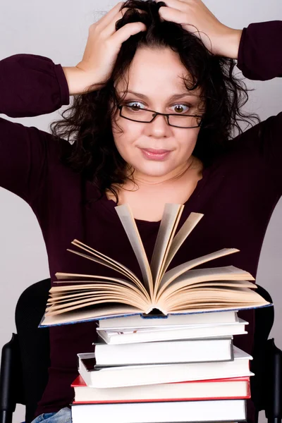 Woman with stack of books — Stock Photo, Image