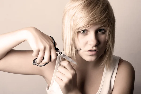 Young woman with scissors — Stock Photo, Image