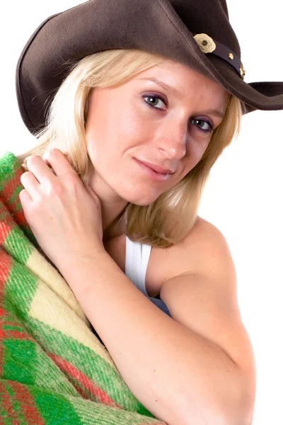 Menina em um chapéu de cowboy com envolto em uma xadrez — Fotografia de Stock