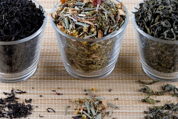 Drei Arten Von Trockenem Tee Gläsern Nahaufnahme Auf Stroh Hintergrund — Stockfoto