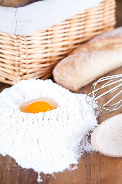 Bread, eggs, whisk and flour — Stock Photo, Image