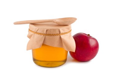 Honey in jar wooden spoon red apple isolated. clipart