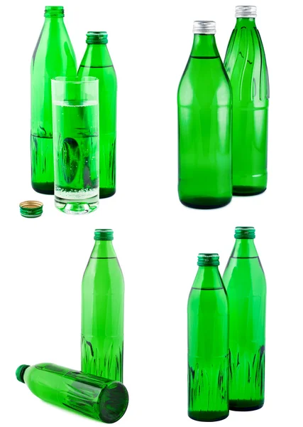 Vatten i flaskor, isolerade vit, ange. urklippsbana. — Stockfoto