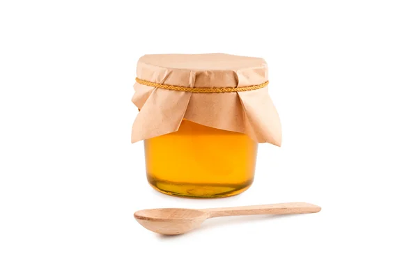 Honey in jar, spoon, isolated white background. — Stock Photo, Image