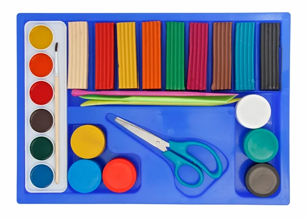 Творческий набор из коробочки с краской из акварели, стецина и ножниц — стоковое фото