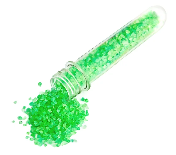 Green dead sea salt pouring out from plastic bottle isolated on — Stock Photo, Image