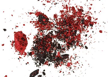 Red and black color crumbled eye shadows isolated on white clipart